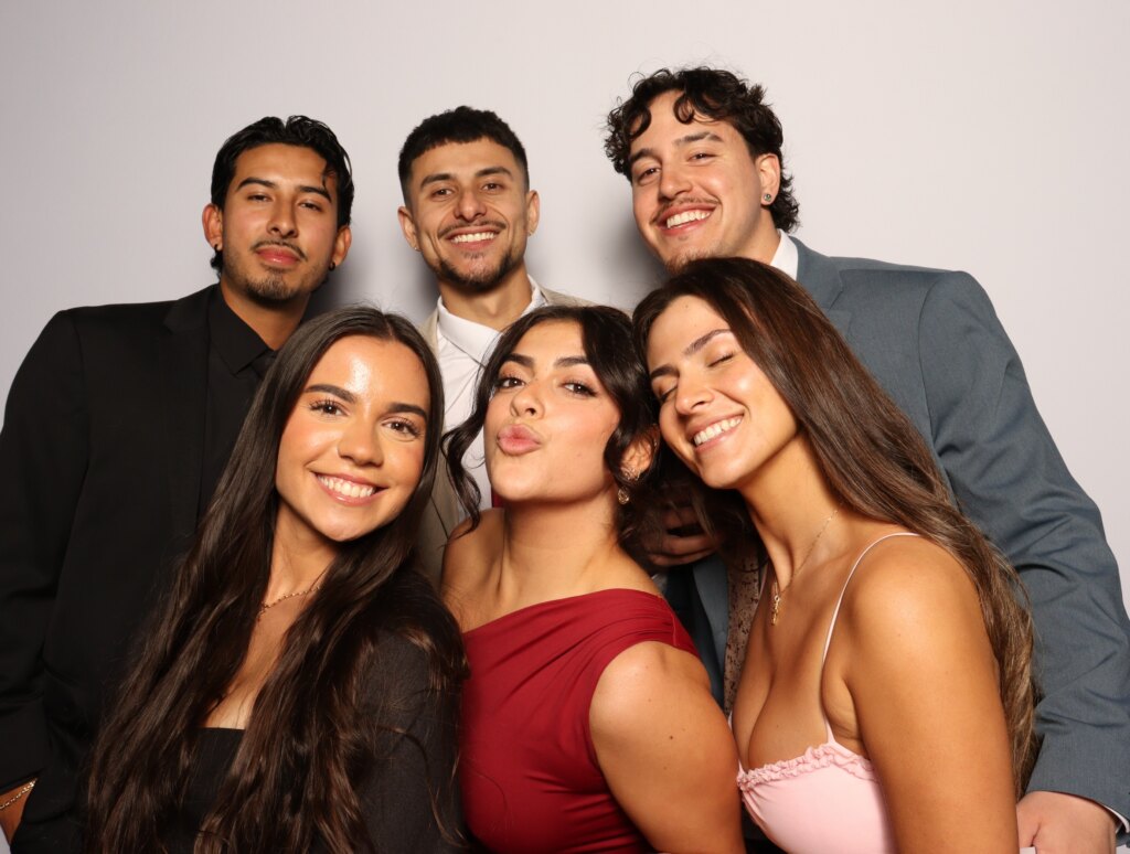 Candid photo booth moment with Captics at a birthday party in the Tri-Cities of Ontario