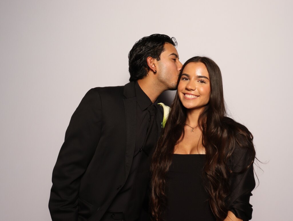 Party guests enjoying the Captics photo booth at a corporate event in Waterloo Region