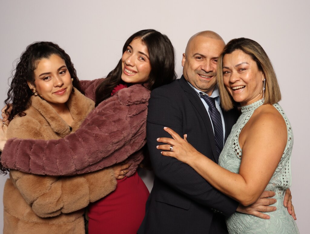 Guests posing at the Captics photo booth during a wedding in Cambridge, Ontario