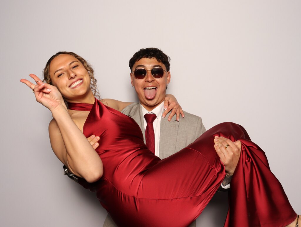 Guests posing at the Captics photo booth during a wedding in Cambridge, Ontario
